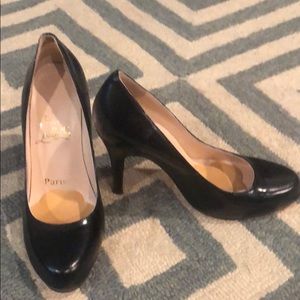 Christian Louboutin black pumps